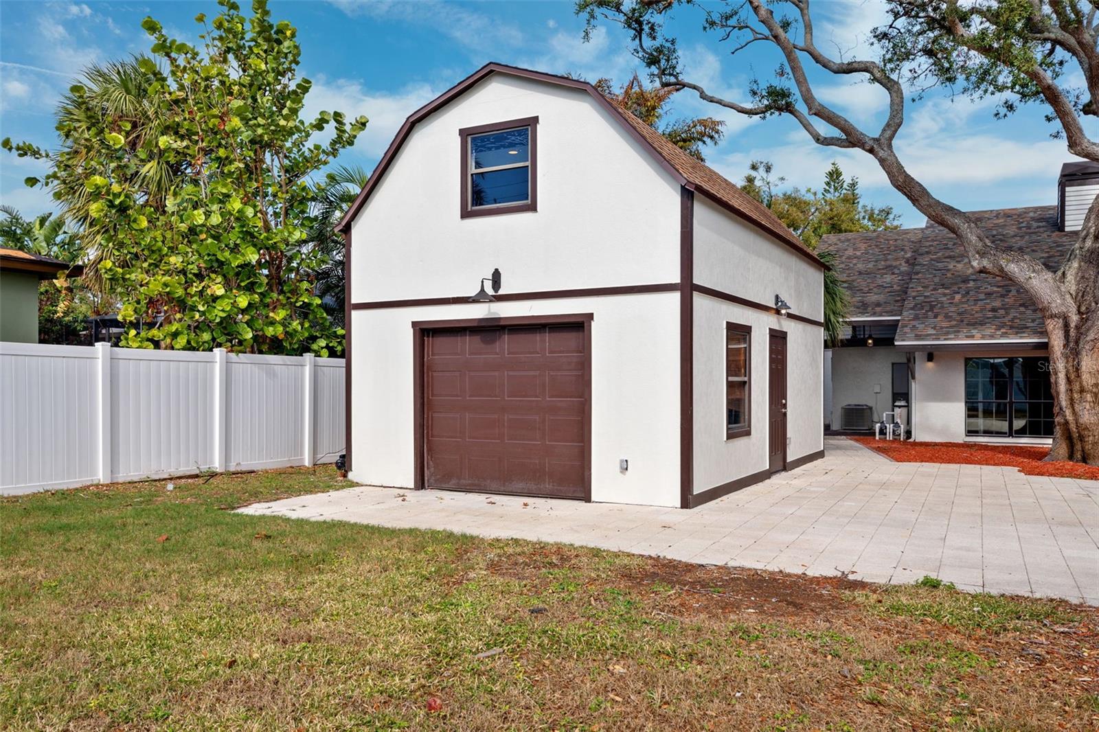 Detached garage ready for a driveway to be added to alleyway access.