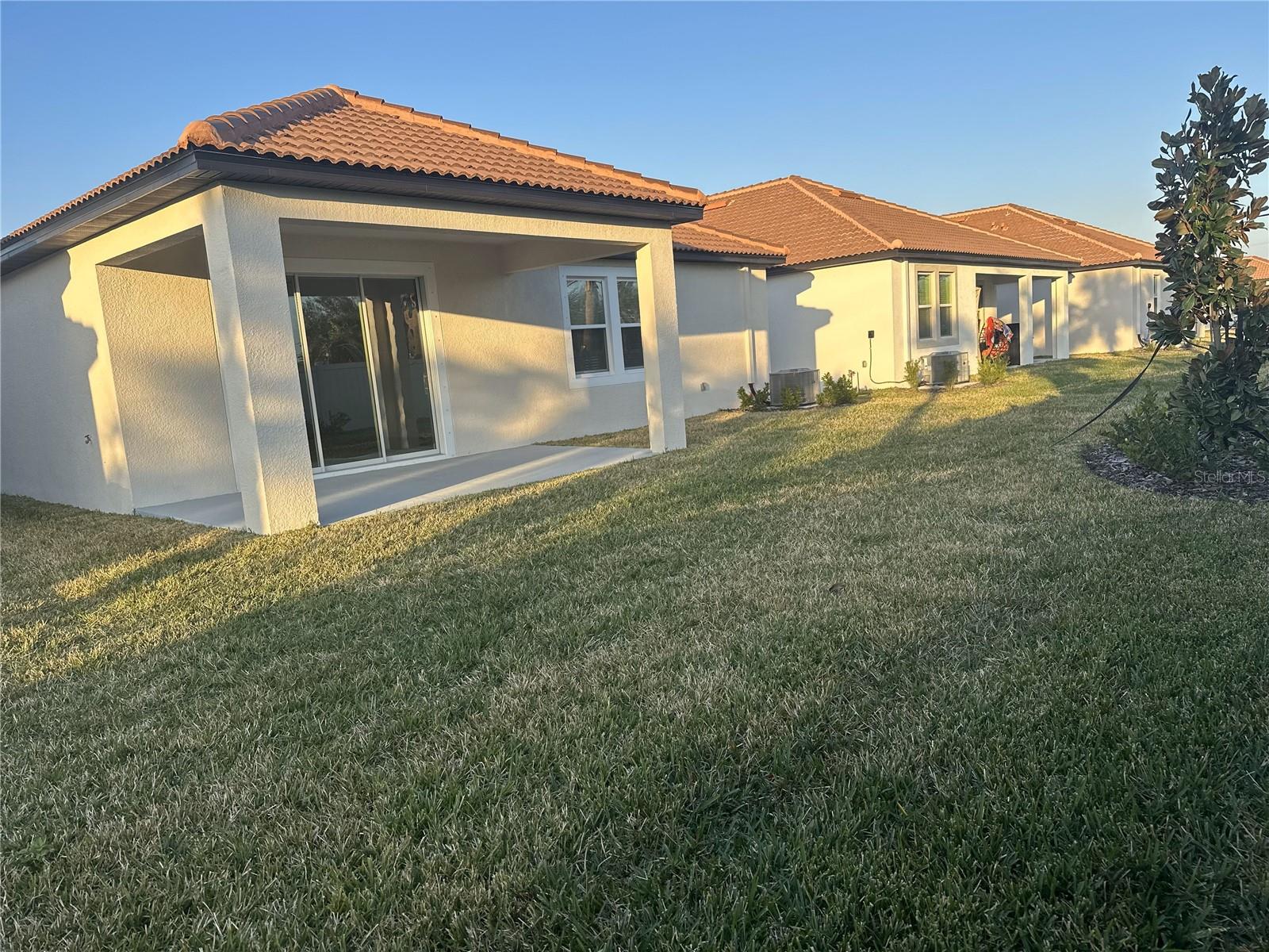 back of home shows patio is extended out from home