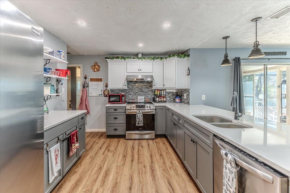 Tiled Backsplash on One Wall..