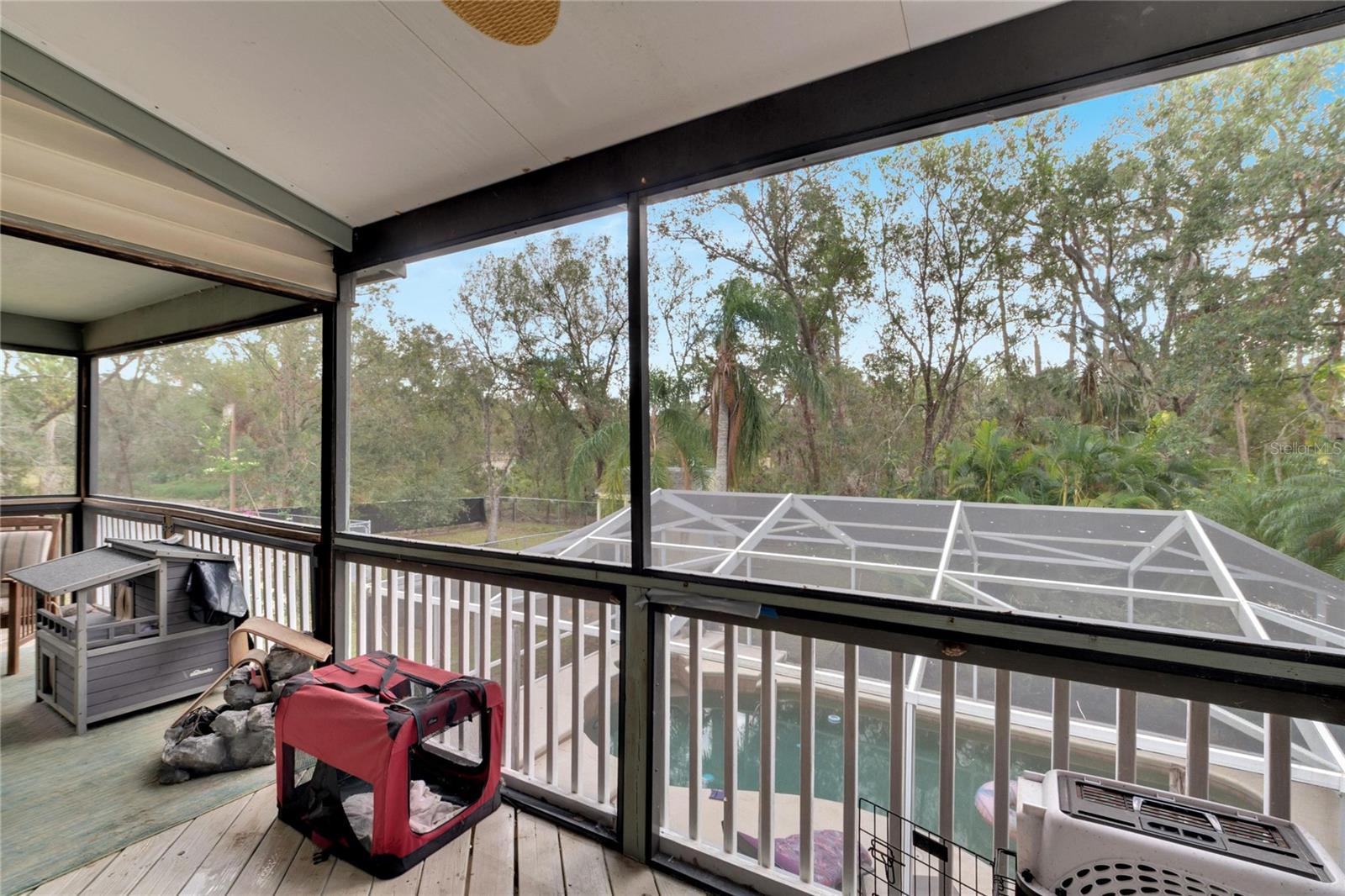 Main Level Rear Screened Porch Overlooking Pool