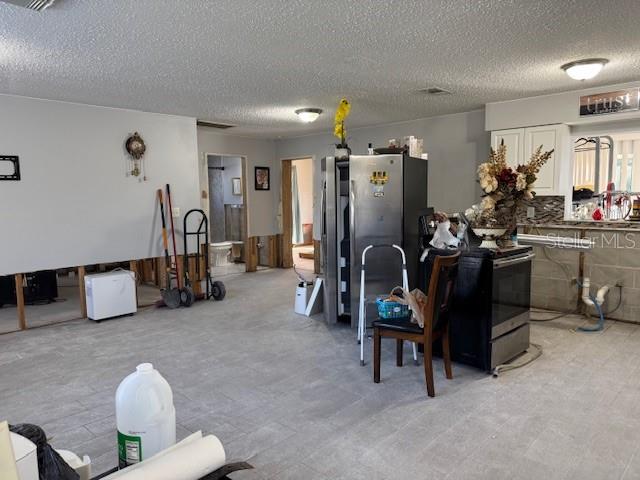 Living room and kitchen area view from the entrance