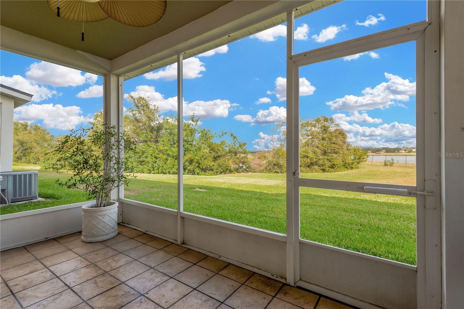 Private Lanai: The outdoor screened lanai is the perfect spot to enjoy morning coffee or relax with friends and family while enjoying peaceful pond views and Florida wildlife.