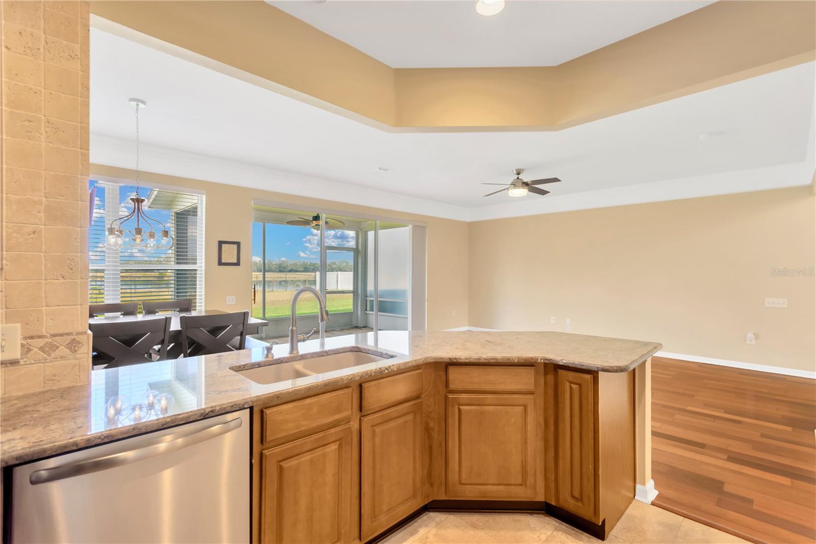 The kitchen is seamlessly connected to the great room with living room and dining room.