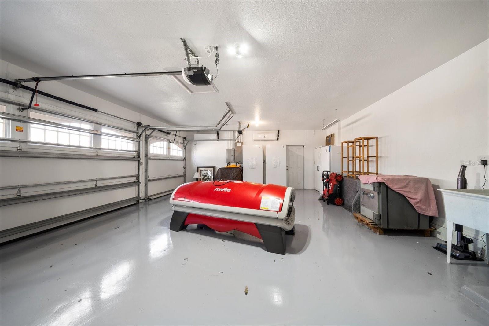 Oversized 3 car garage, air conditioned too!