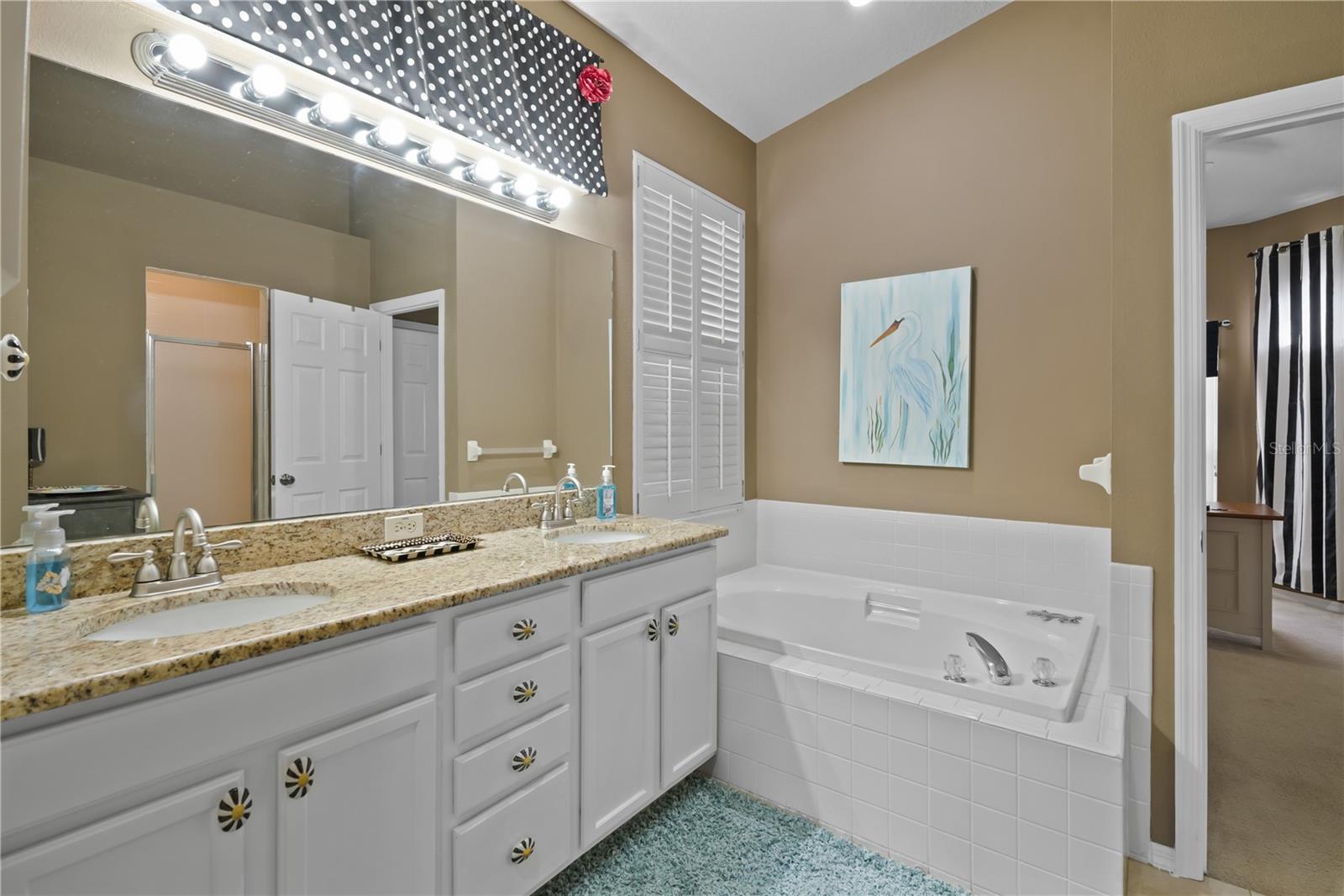 Primary Bathroom with separate shower and tub.