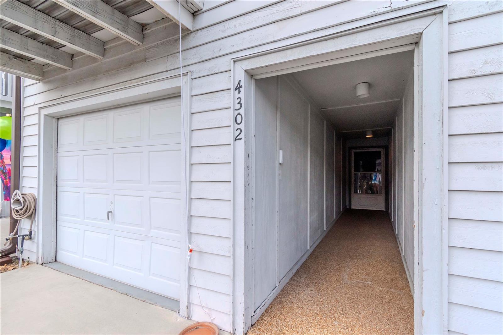 Private 1 car garage and entry.