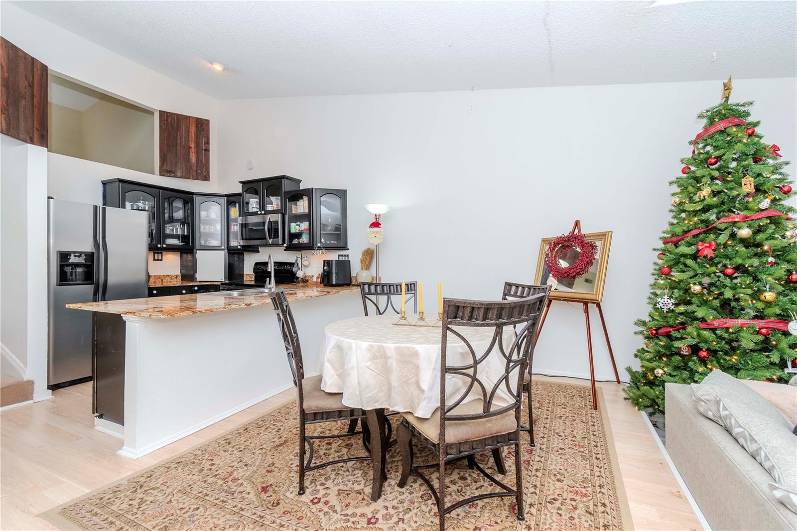 Step from the foyer to your kitchen and dining area.