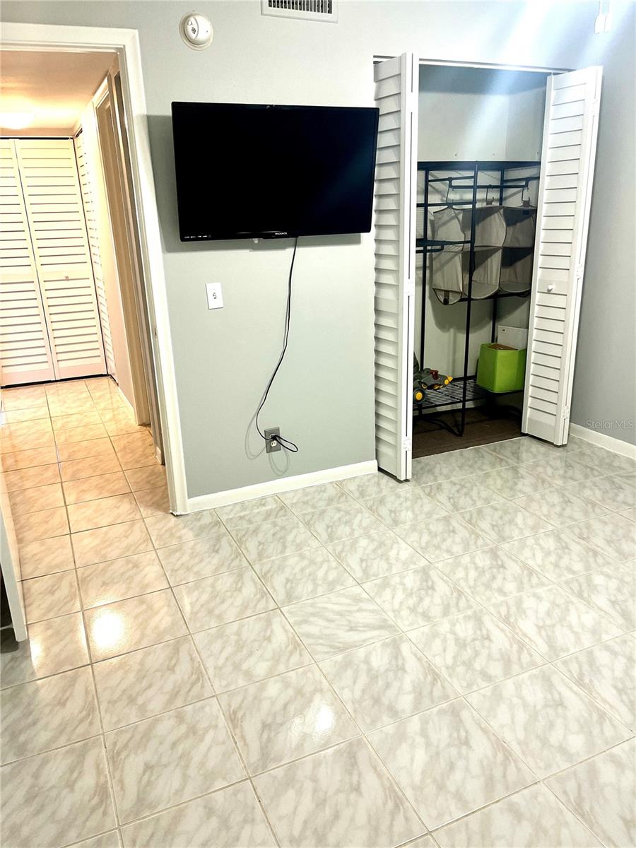 Guest bedroom with TV