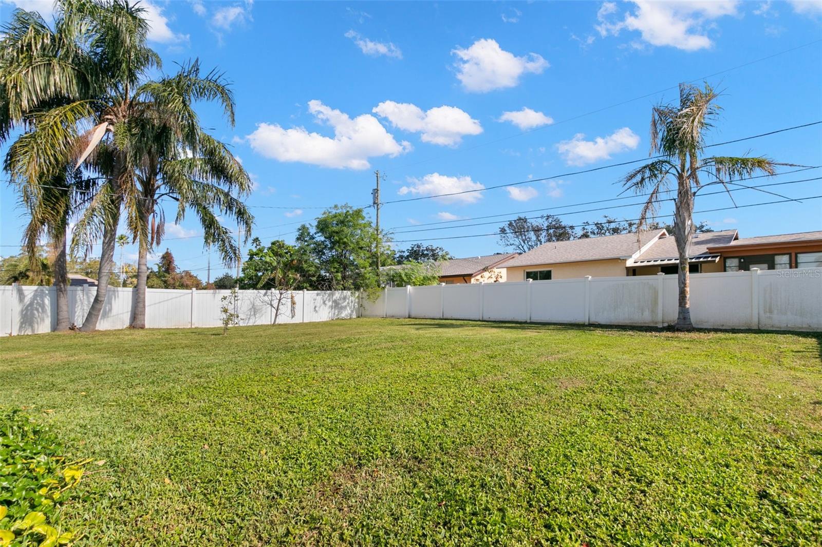 Put in your pool in this large back yard