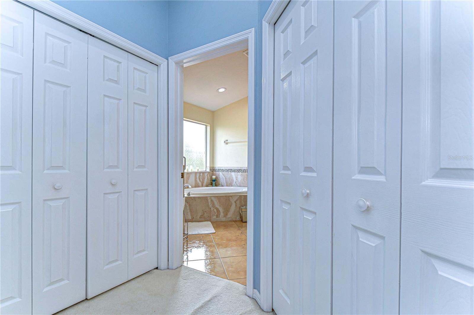 Dual walk in closets pave your entryway to the primary bath!