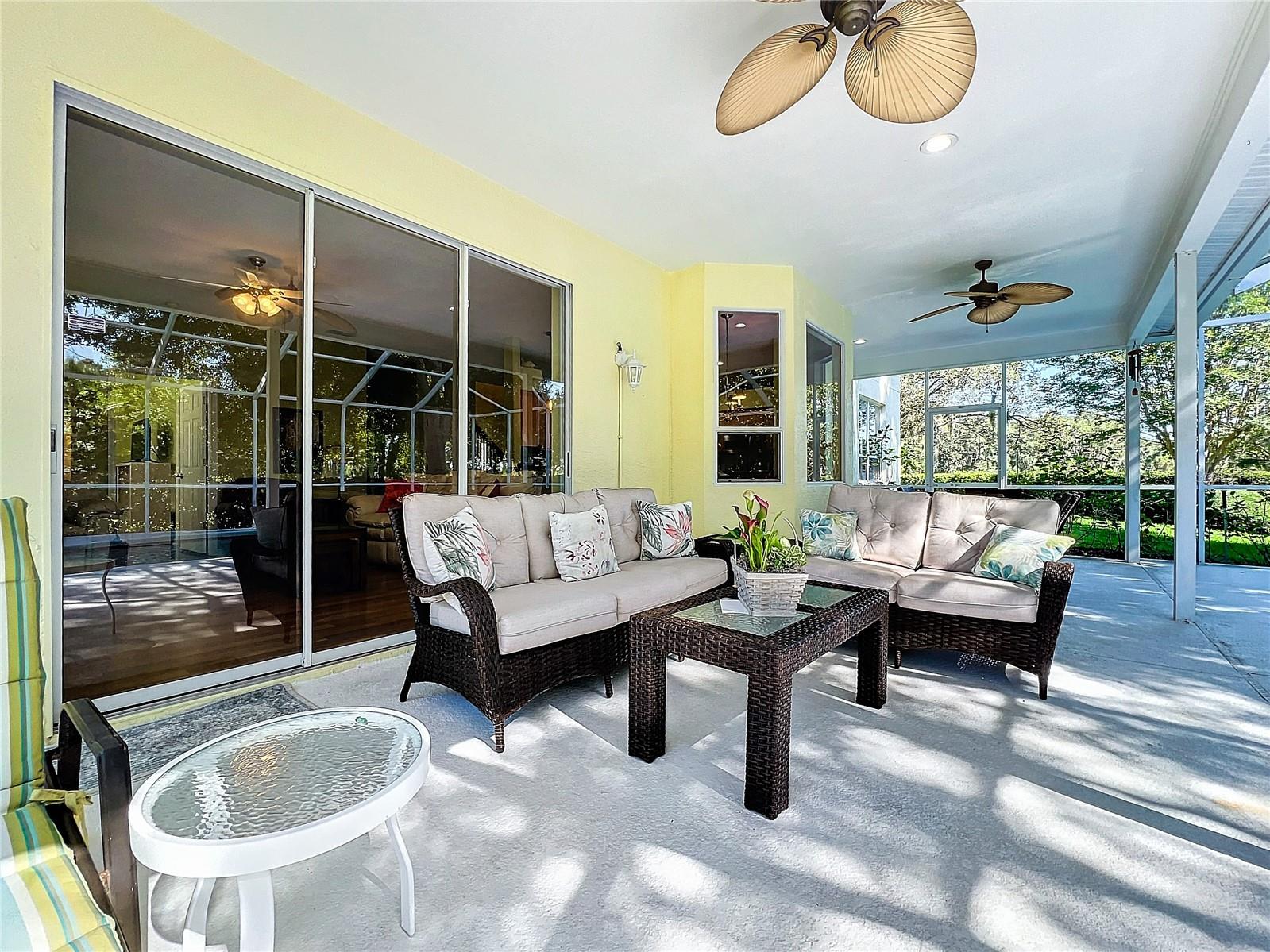 Take a break from the Florida sun under the covered space and a ceiling fan!