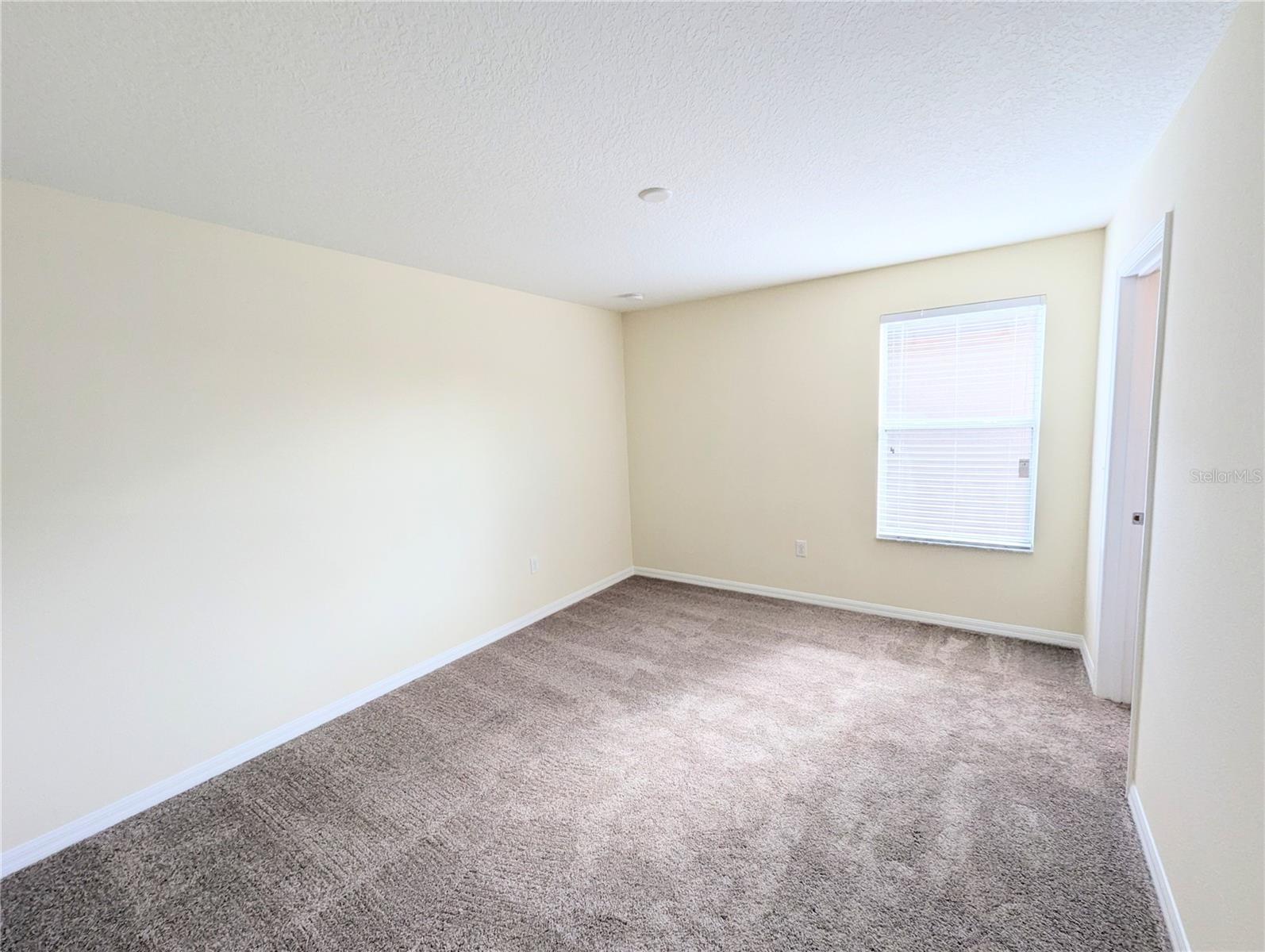 Upstairs Bedroom 3 with walk-in closet