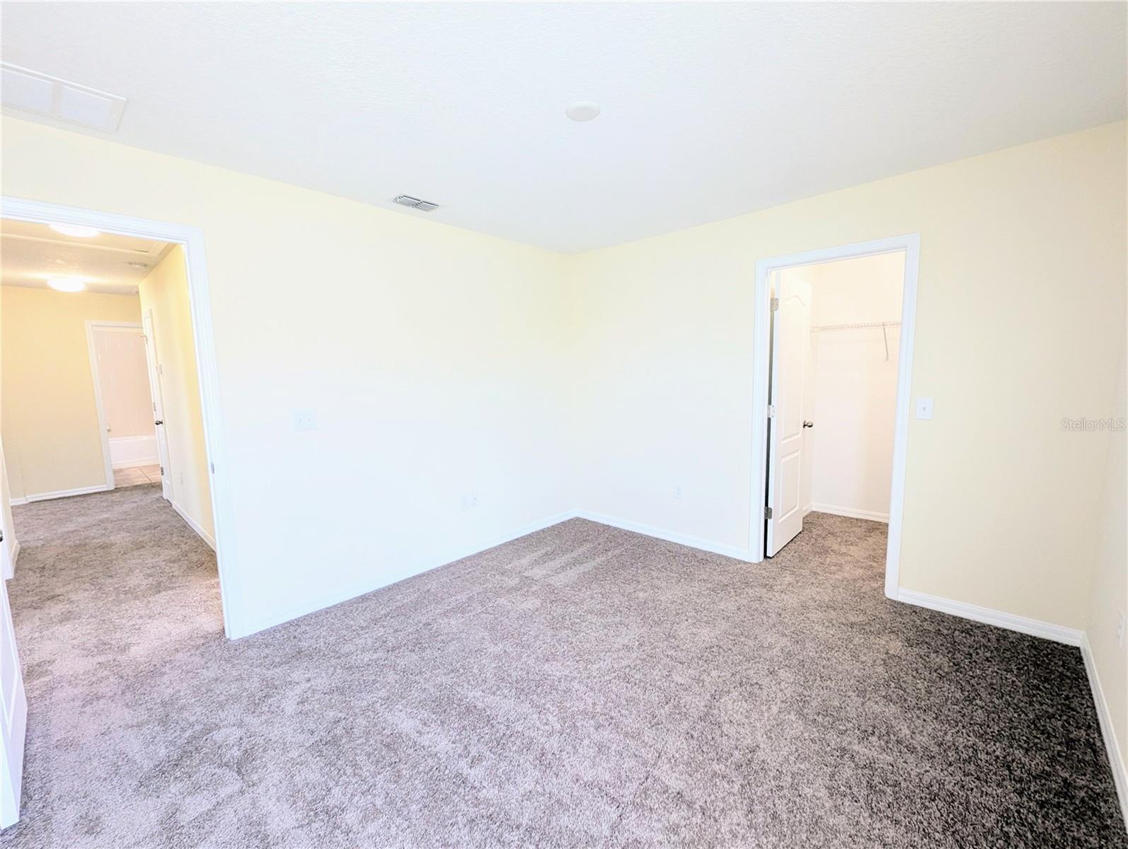 Upstairs Bedroom 3 with walk-in closet