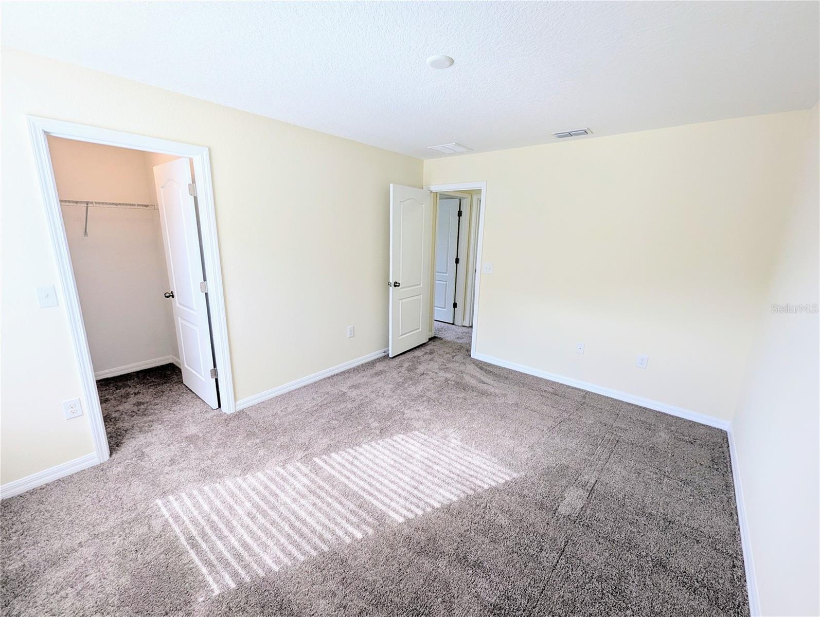 Upstairs Bedroom 3 with walk-in closet