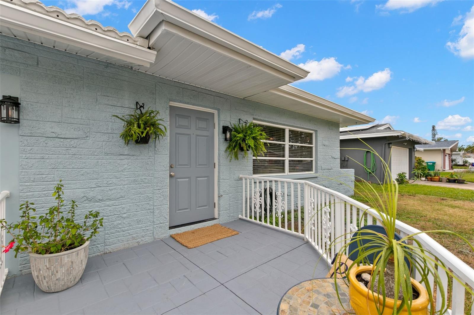 gated wing porch/exterior entrance to bedroom 3/office