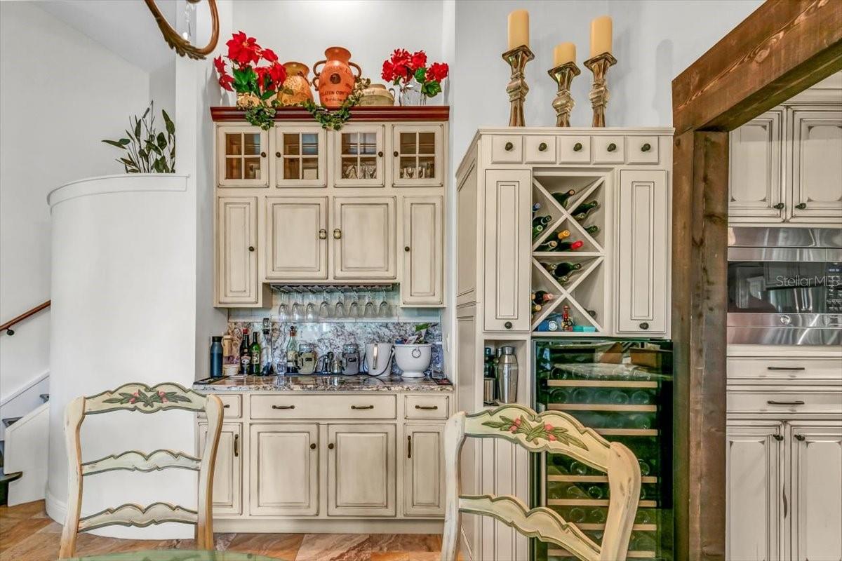 Custom kitchen with built in storage and wine rack