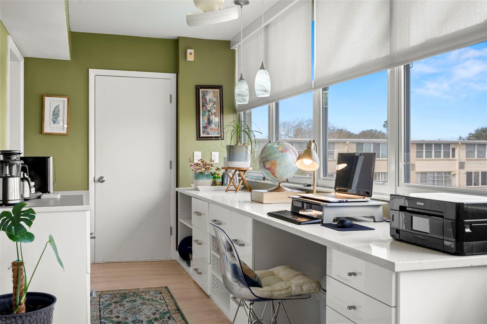 The finished sunroom, complete with extra cabinetry and pantry storage.