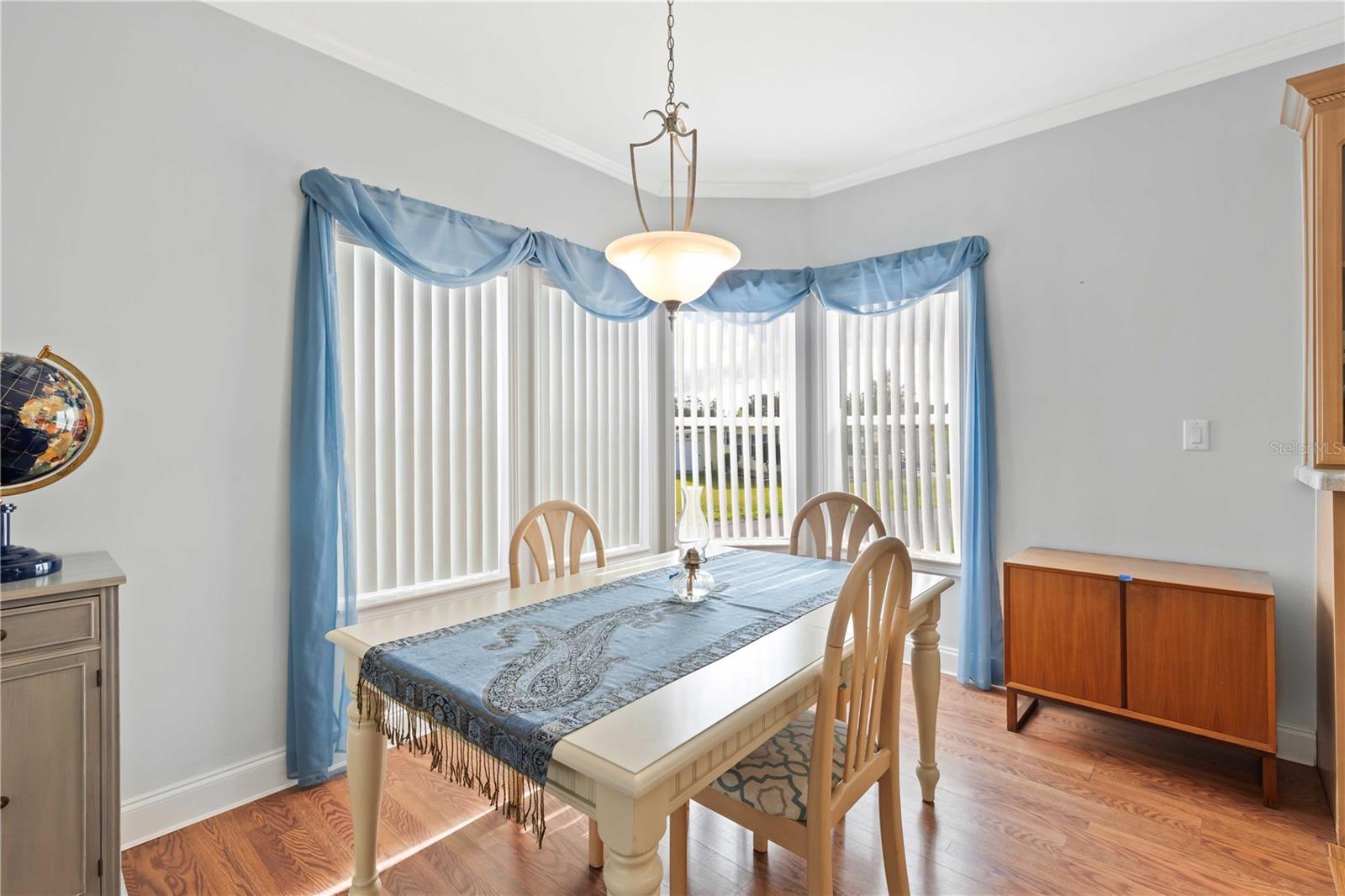 Dining area is open with kitchen and living room.