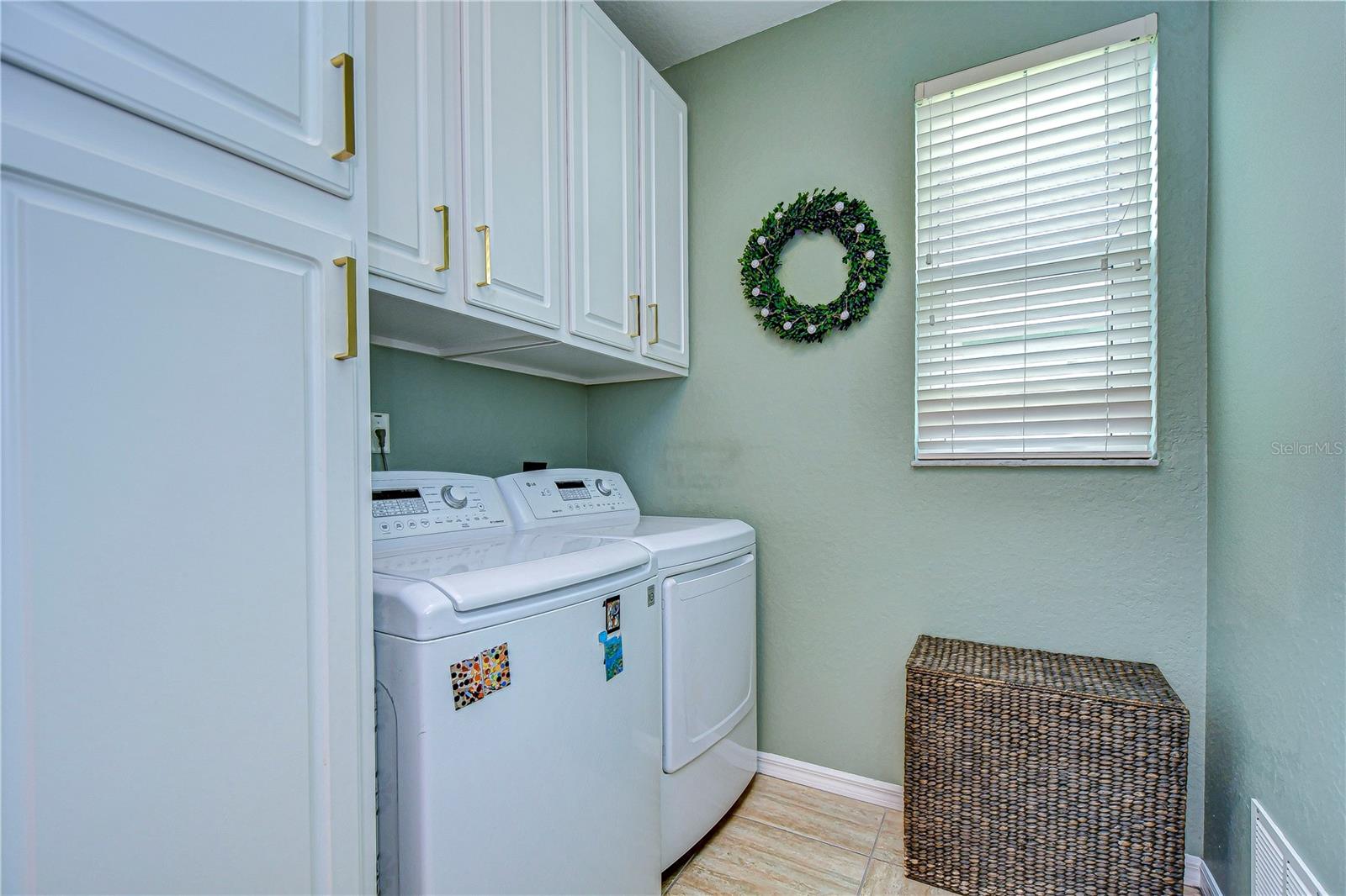 Updated laundry room with lots of storage space!