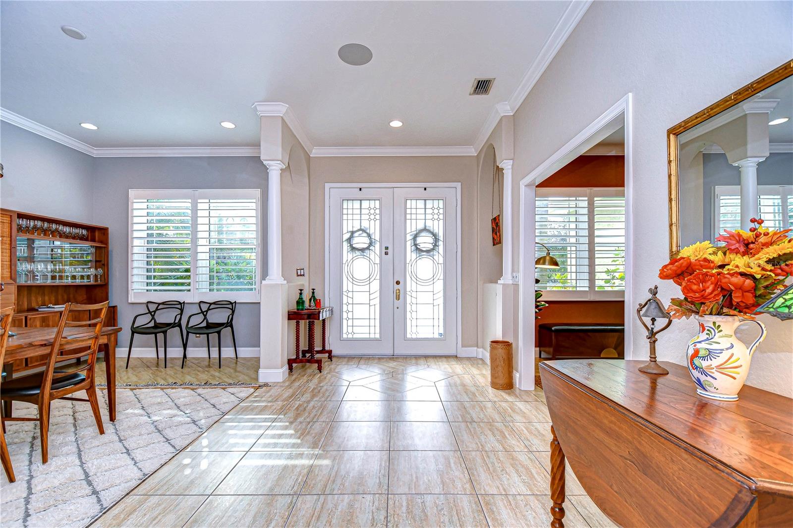 Enter through the front doors into an open foyer with stunning crown molding!