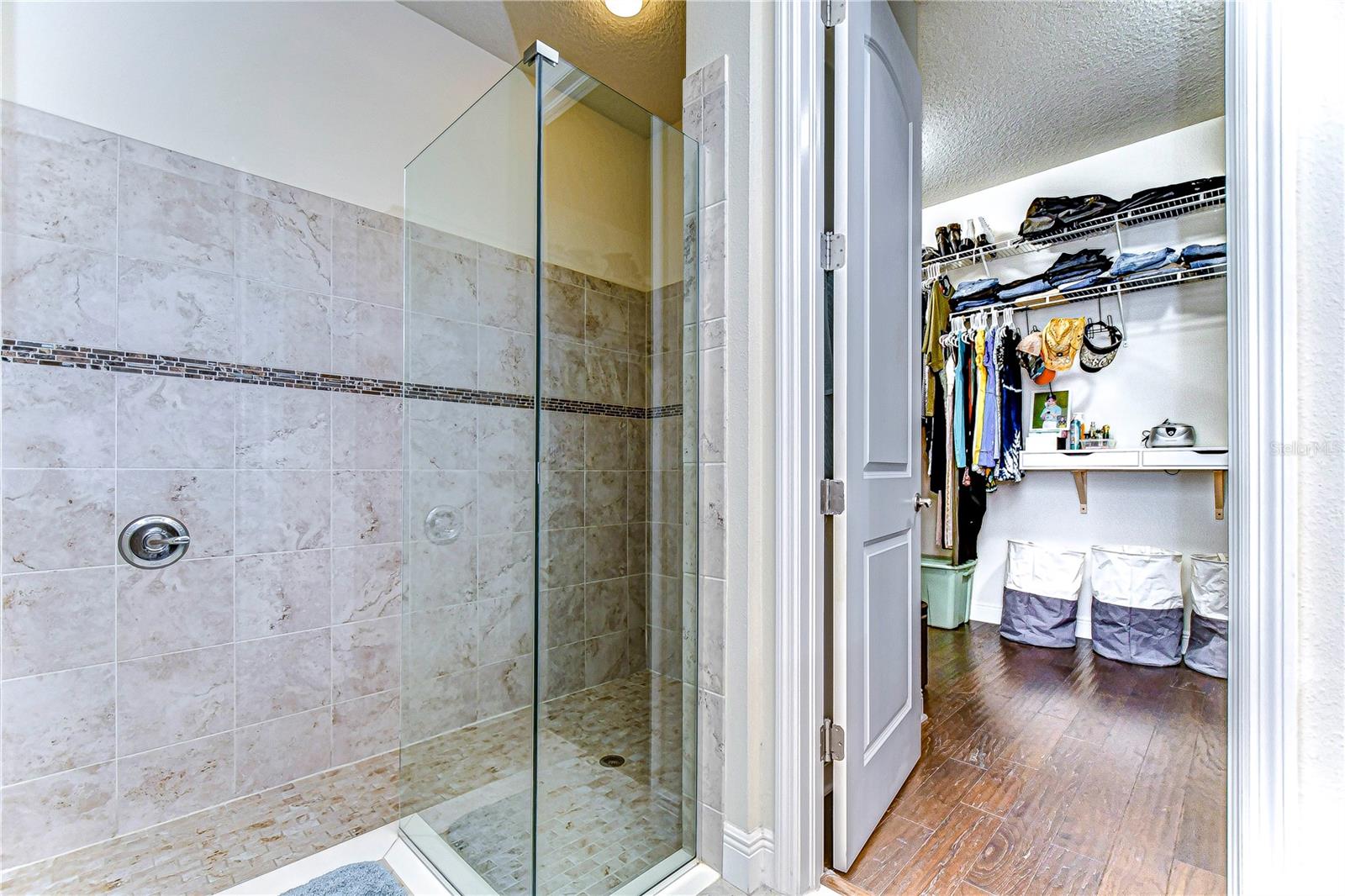 En-Suite bathroom with separate walk-in shower, and HUGE walk-in closet!