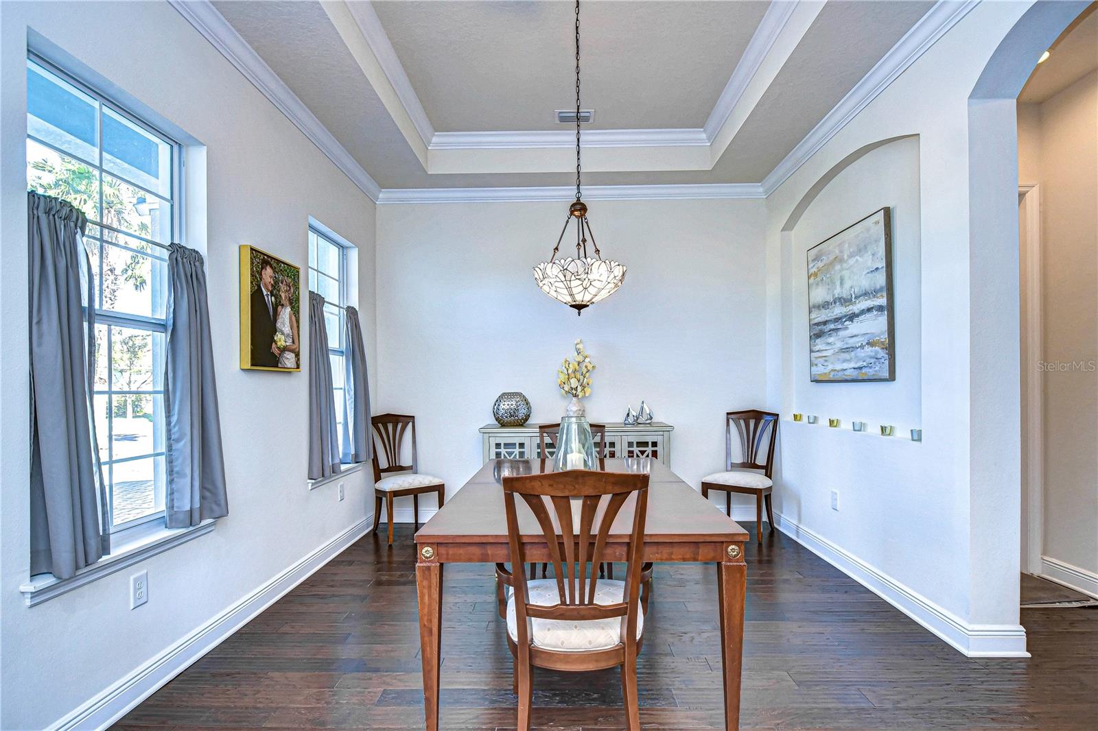 Jaw dropping dining room with deep tray ceiling!