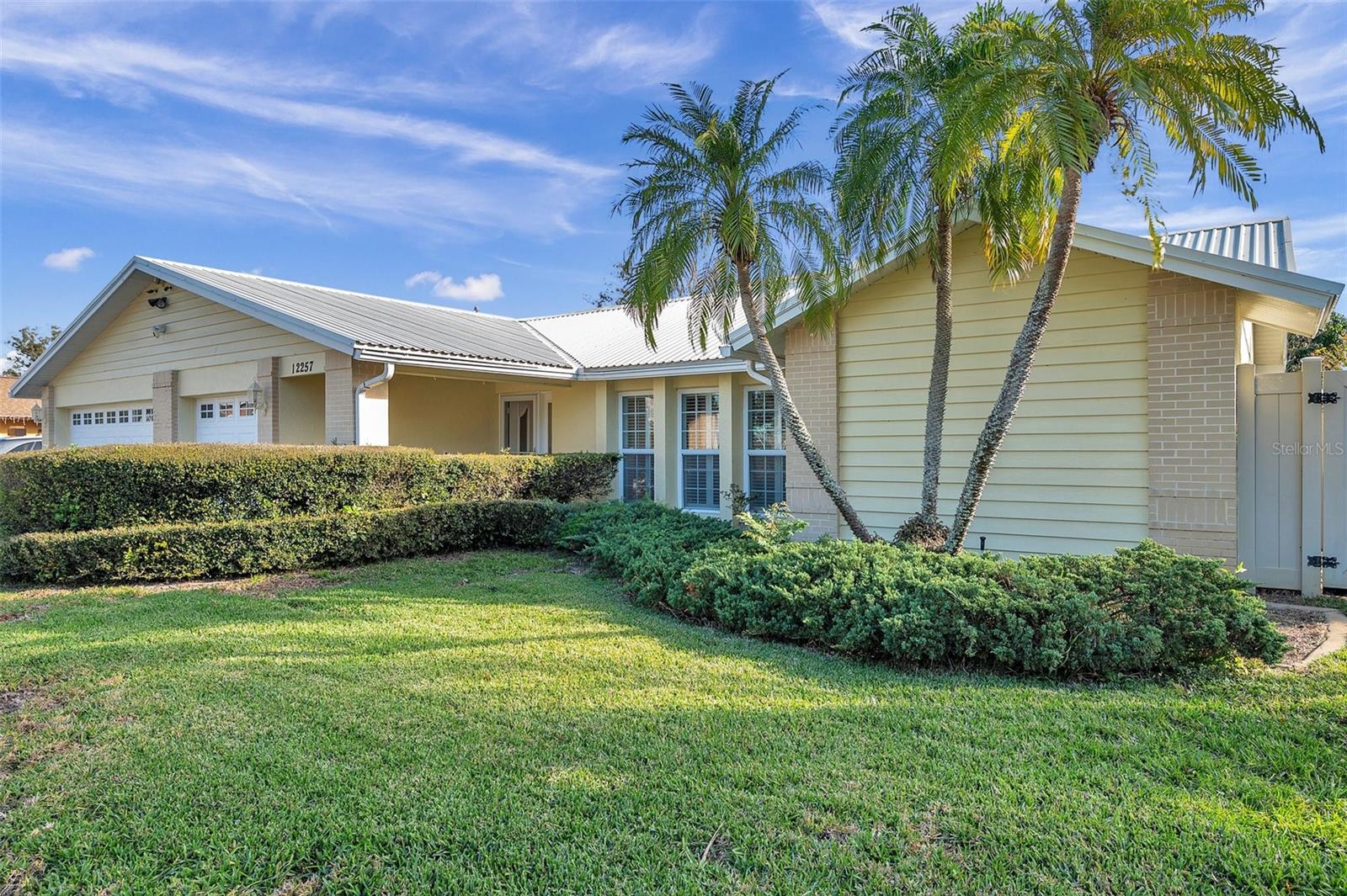 Front of home that faces West. This property is located in the unincorporated section of Largo. You ARE ALLOWED TO STORE A BOAT on the property. It is NOT deed restricted however it looks like it is!! The neighborhood is well cared for by the owners!