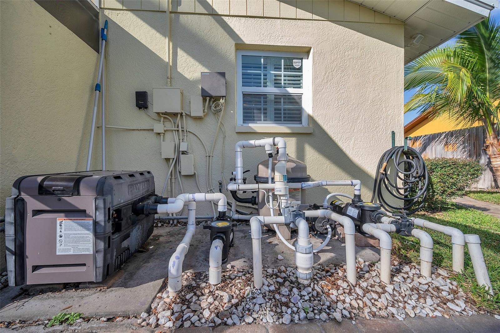 Pool heater, 2 brand new pool pumps, DE filter, pool sweep motor, Hayward chlorinator for salt conversion.Back yard lighting controls. Water softener is on right side of house in shed.