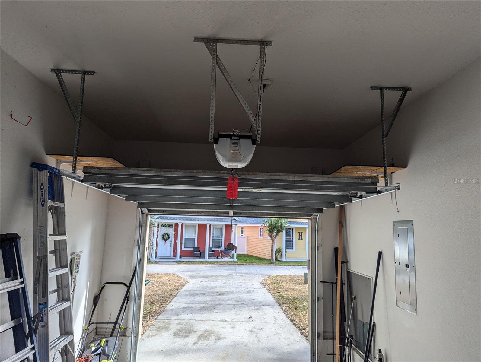 Storage located above garage door