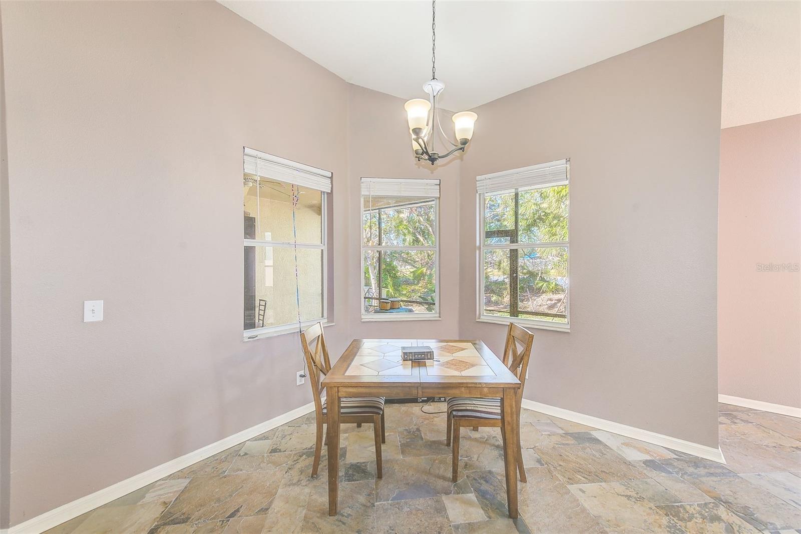 COZY DINETTE WITH VIEWS OF BACKYARD & LAKE