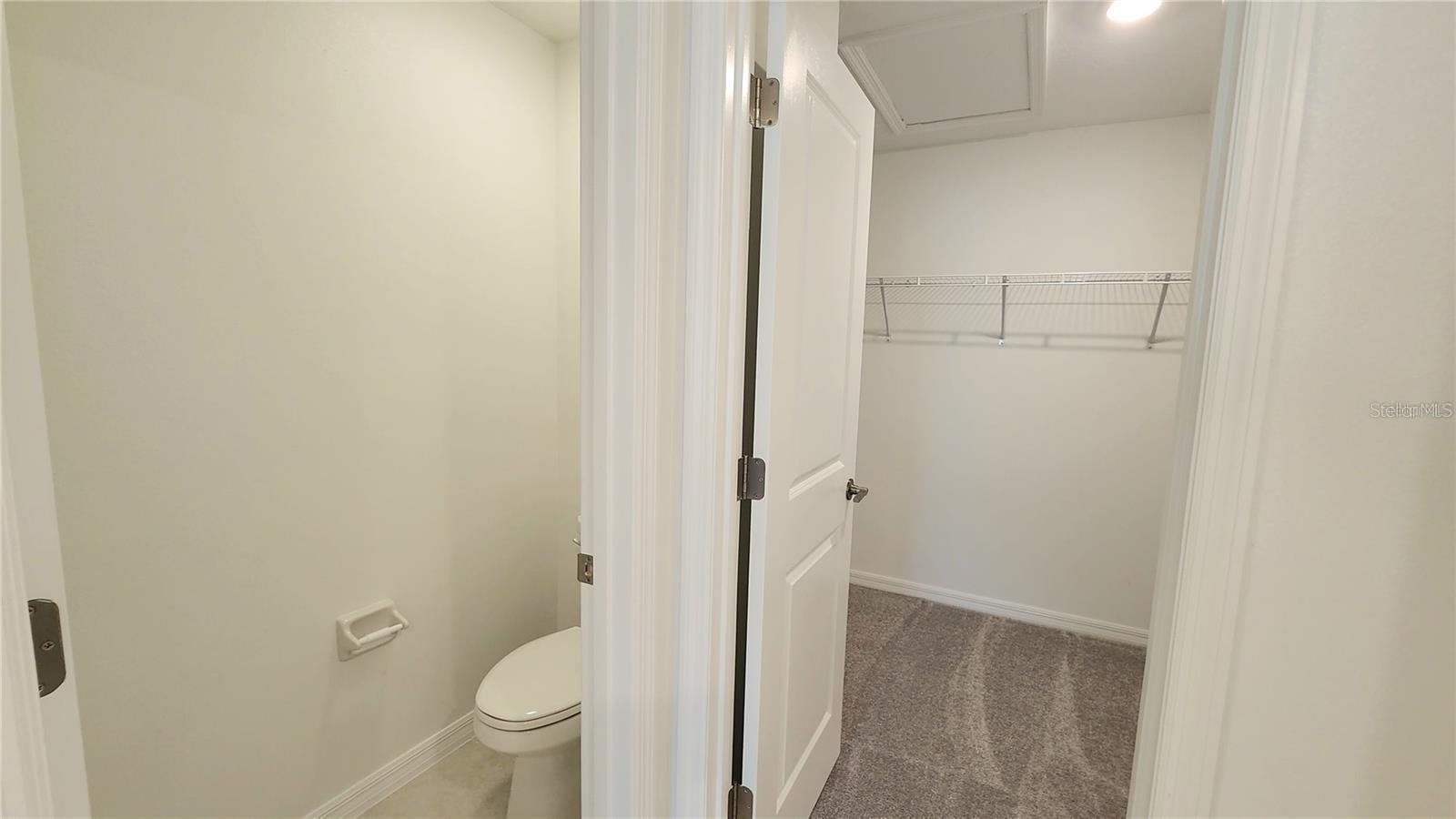 Primary Water Closet and Walk In Closet