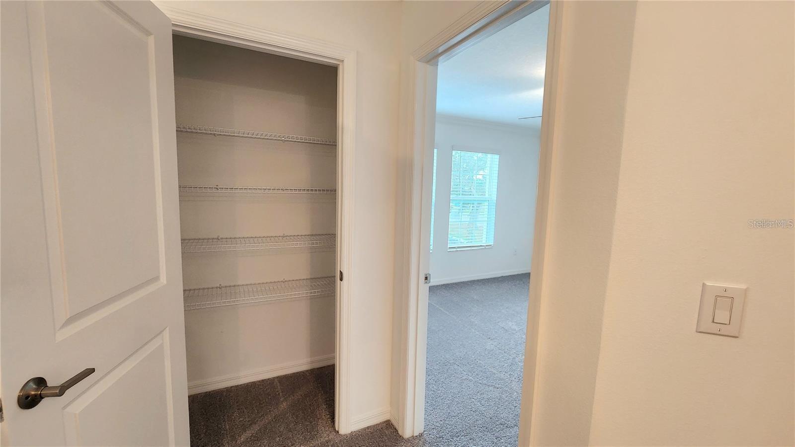 Hall Closet next to Primary Bedroom