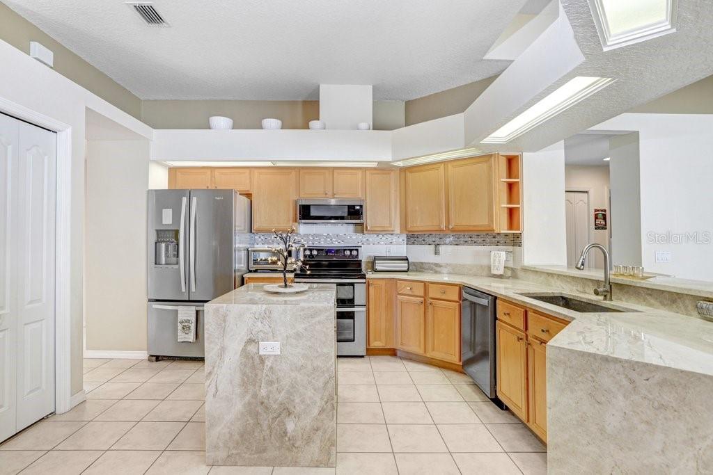 Kitchen with new granite countertops, soft close cabinets and stainless appliances