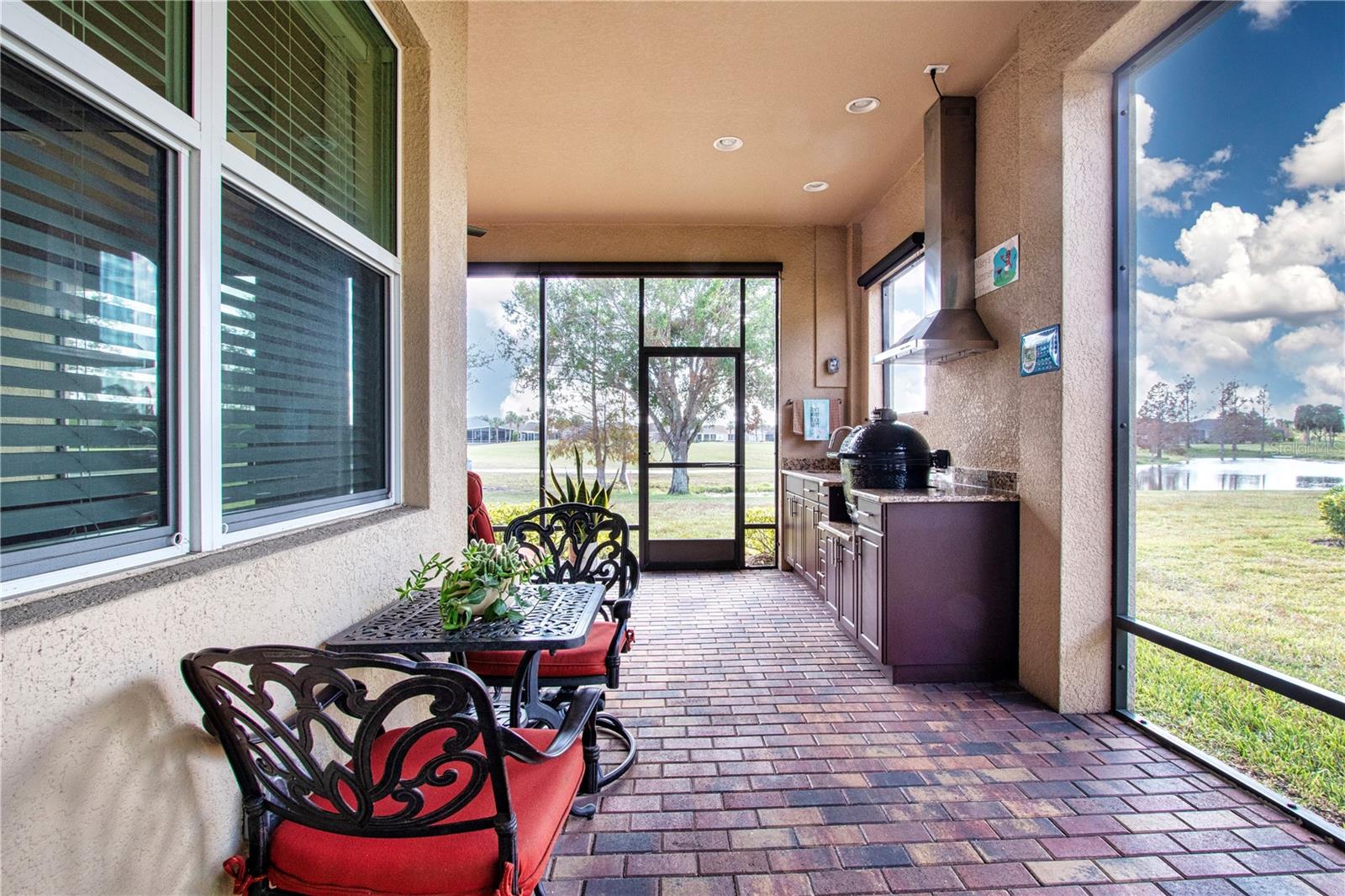 Covered enclosed Lanai with Summer Kitchen