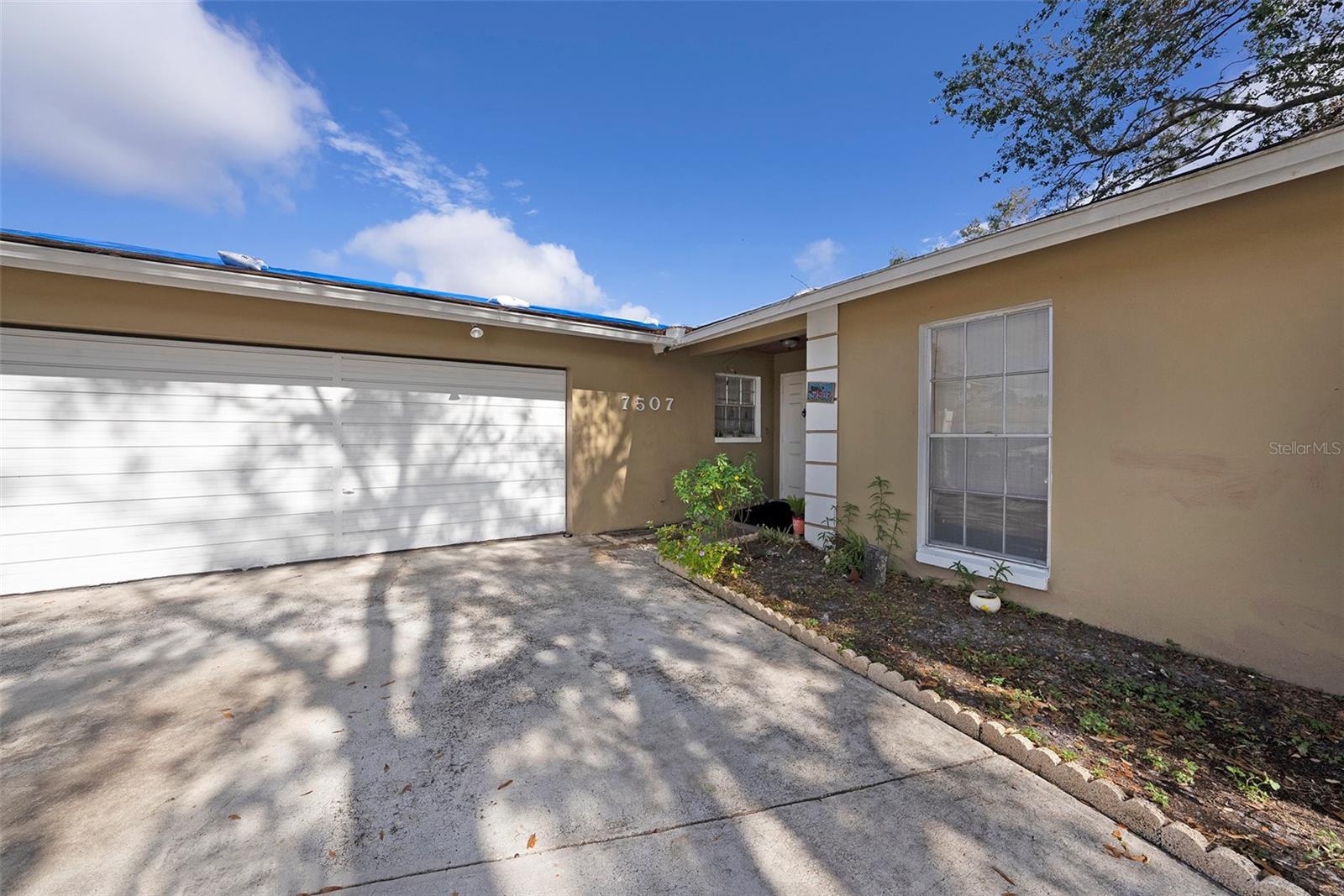 Two-car garage and front entrance.