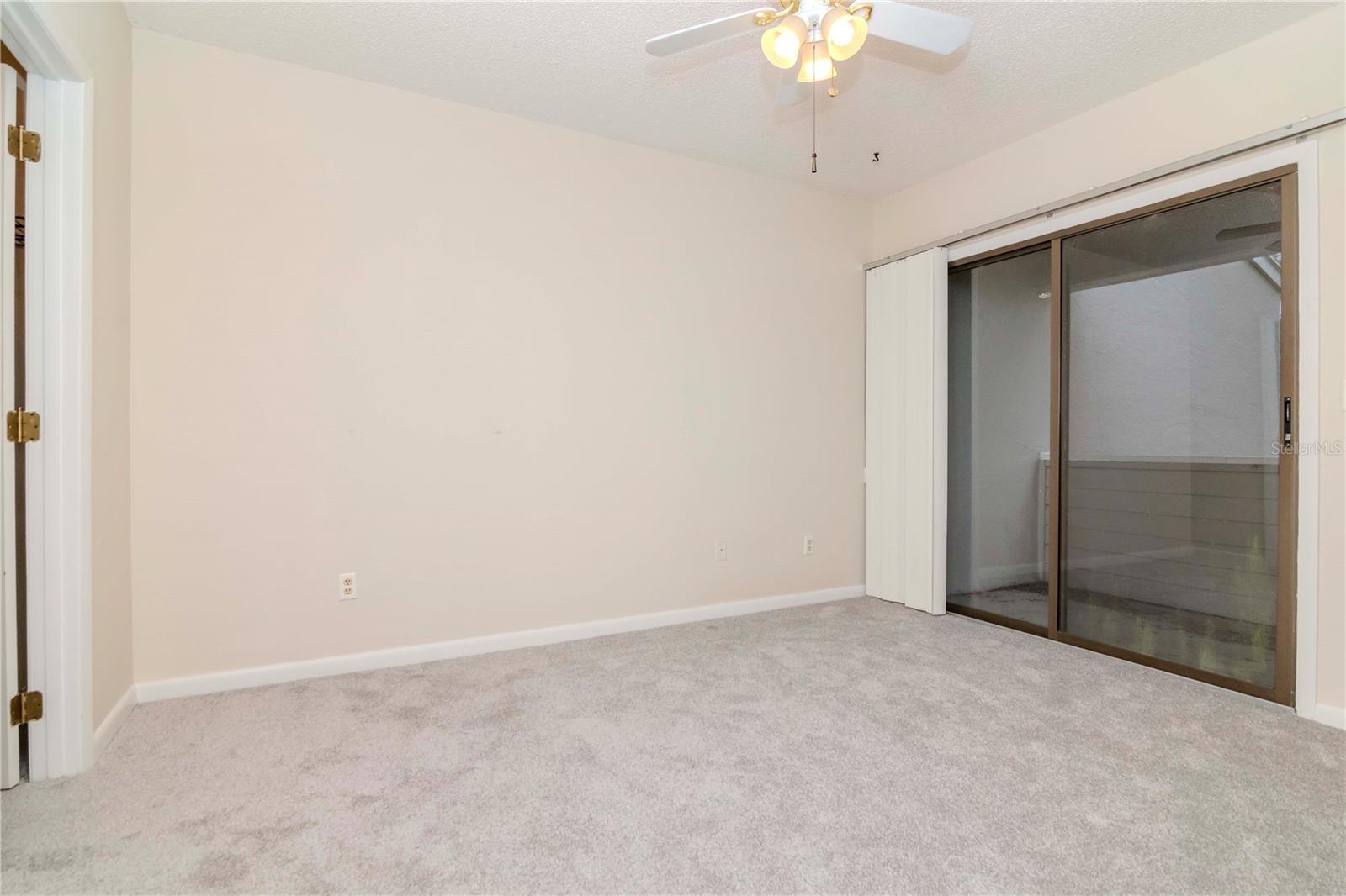 2nd bedroom offers a private balcony