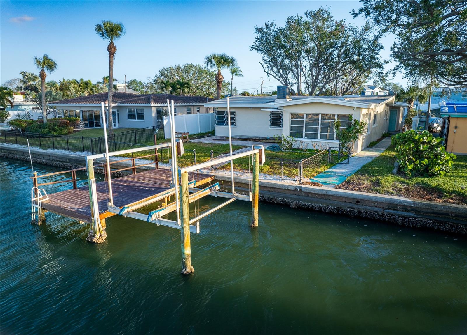 It's a perfect setting for boat enthusiasts. With an ample-sized dock and boat lift, getting out on the water will be a breeze!