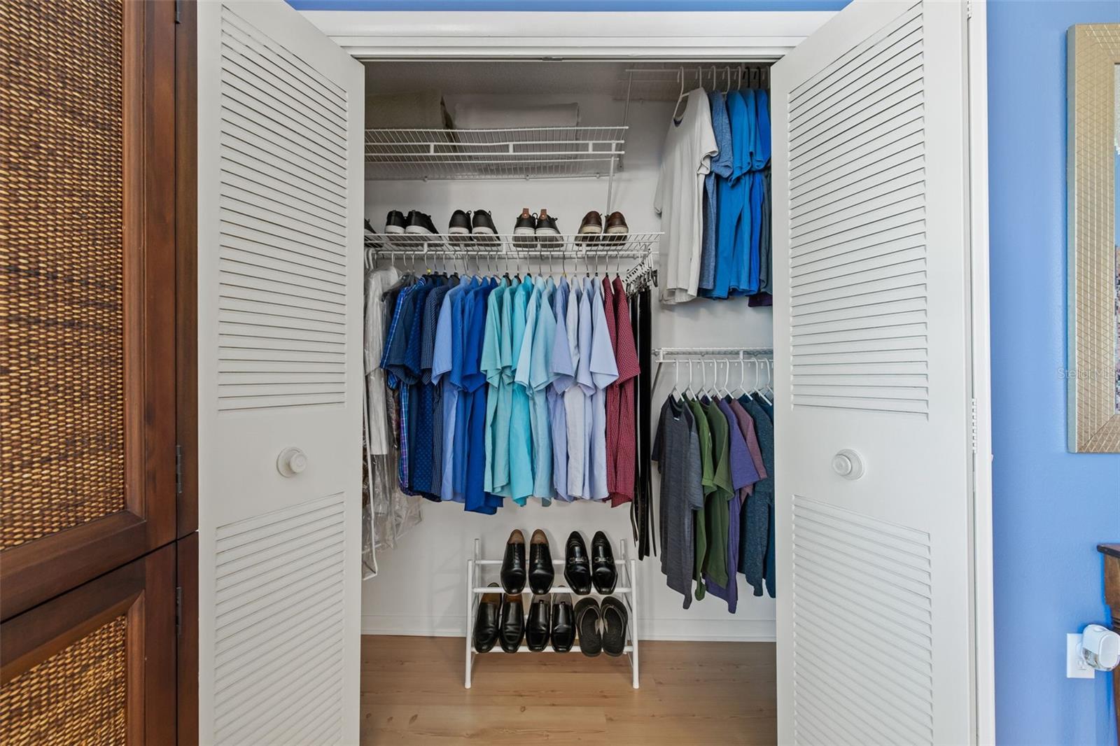 Closet within second bedroom.