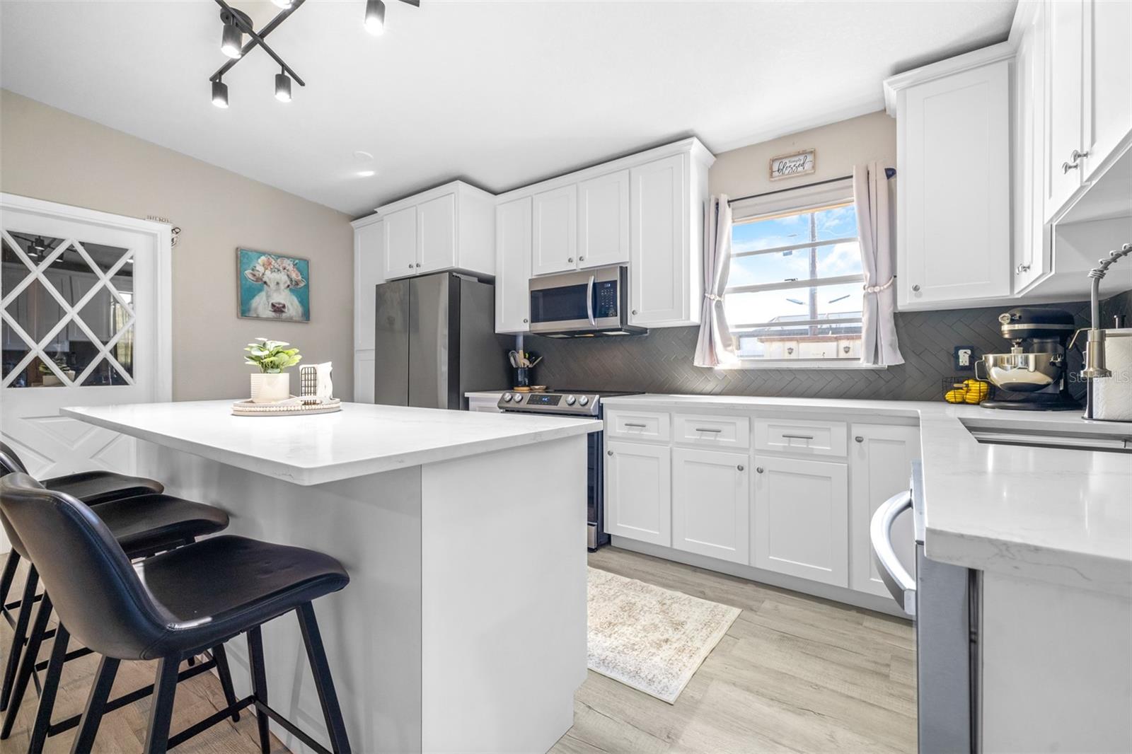 Door leads to storage and laundry room