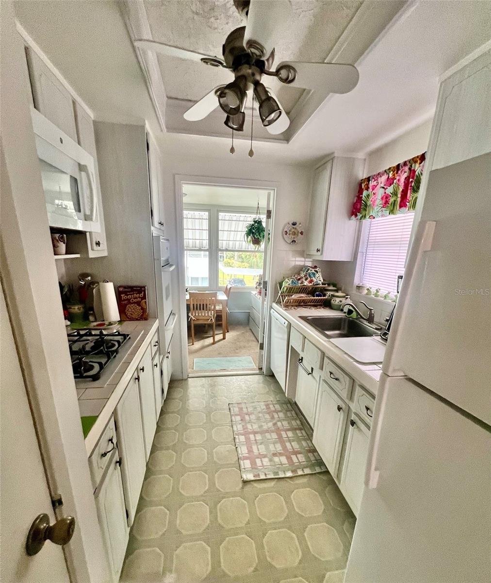 Kitchen includes dishwasher and gas stove