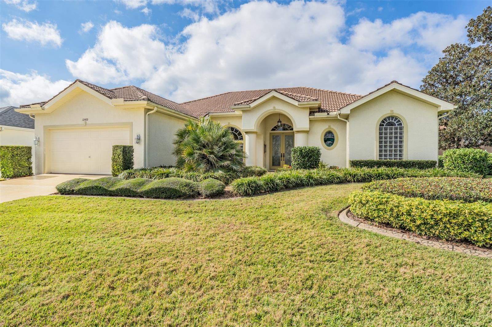 High and Dry with a long driveway and Tile roof!