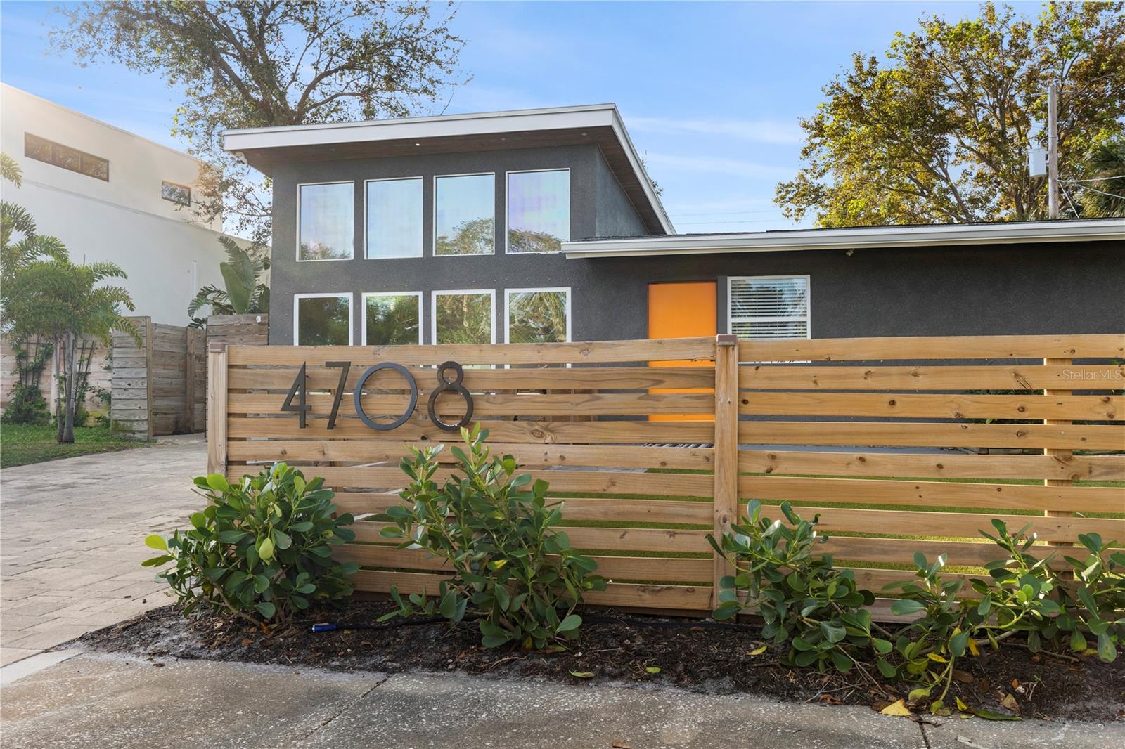 Benefit from modern amenities including a Tesla home charger, 2-year-old HVAC system, and LG WashTower for effortless laundry care in this South Tampa home.