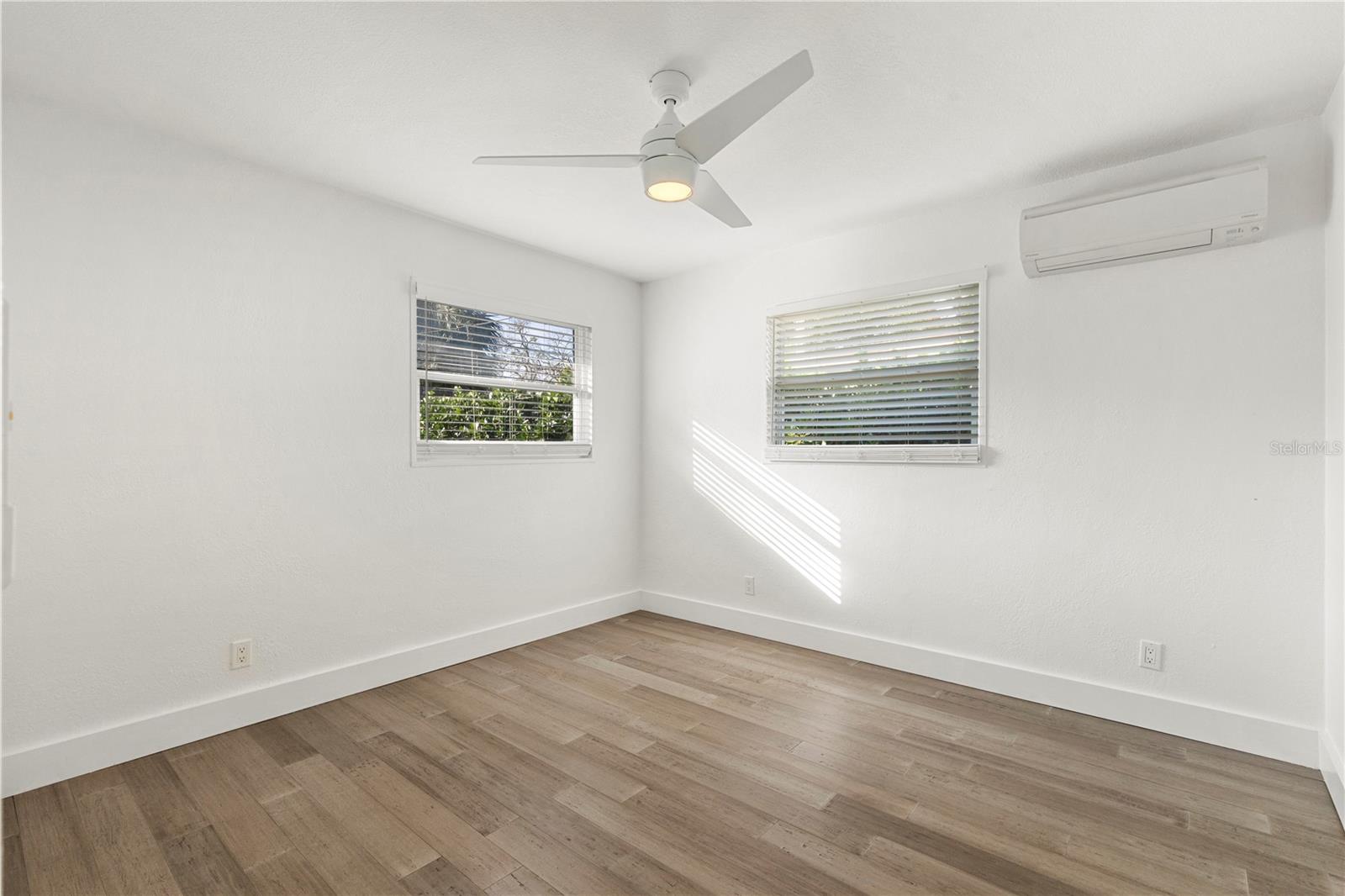 Retreat to the stunning master bedroom with soaring 12-15’ ceilings, elegant design, and ample natural light—perfect for creating your own tranquil sanctuary.