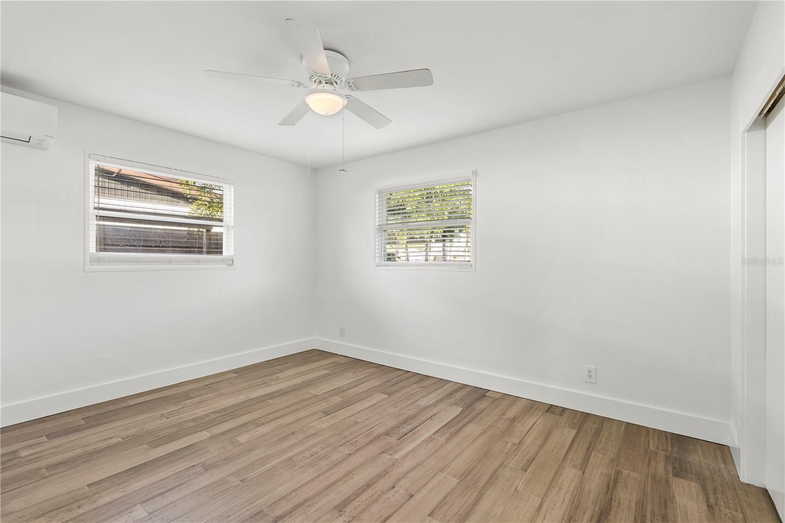 Retreat to the stunning master bedroom with soaring 12-15’ ceilings, elegant design, and ample natural light—perfect for creating your own tranquil sanctuary.