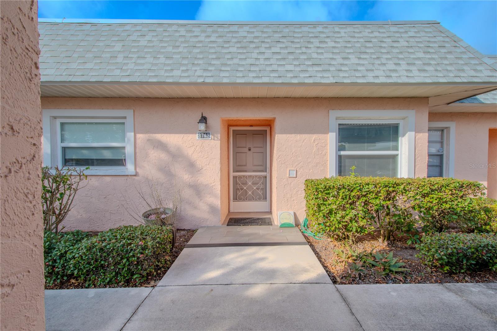 2 Bedroom, 2 bath with Screened in Lanai on the 7th Green of Seven Springs Golf and Country Club