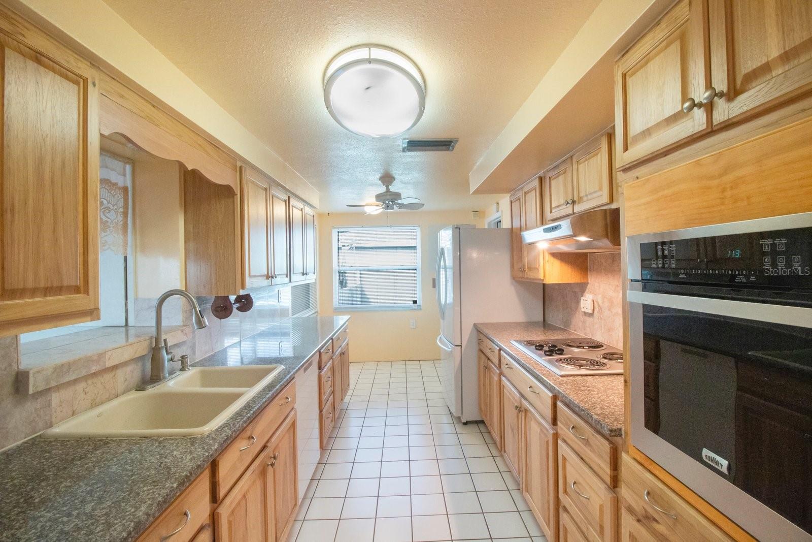 Granite Countertops & Wood Cabinets