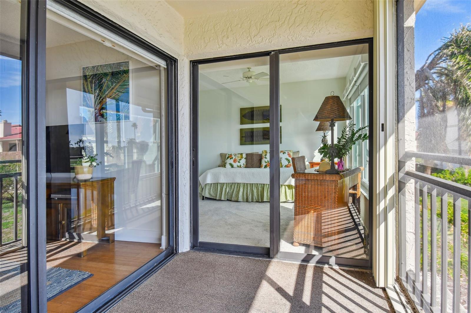 Slider doors to living area & 2nd bedroom