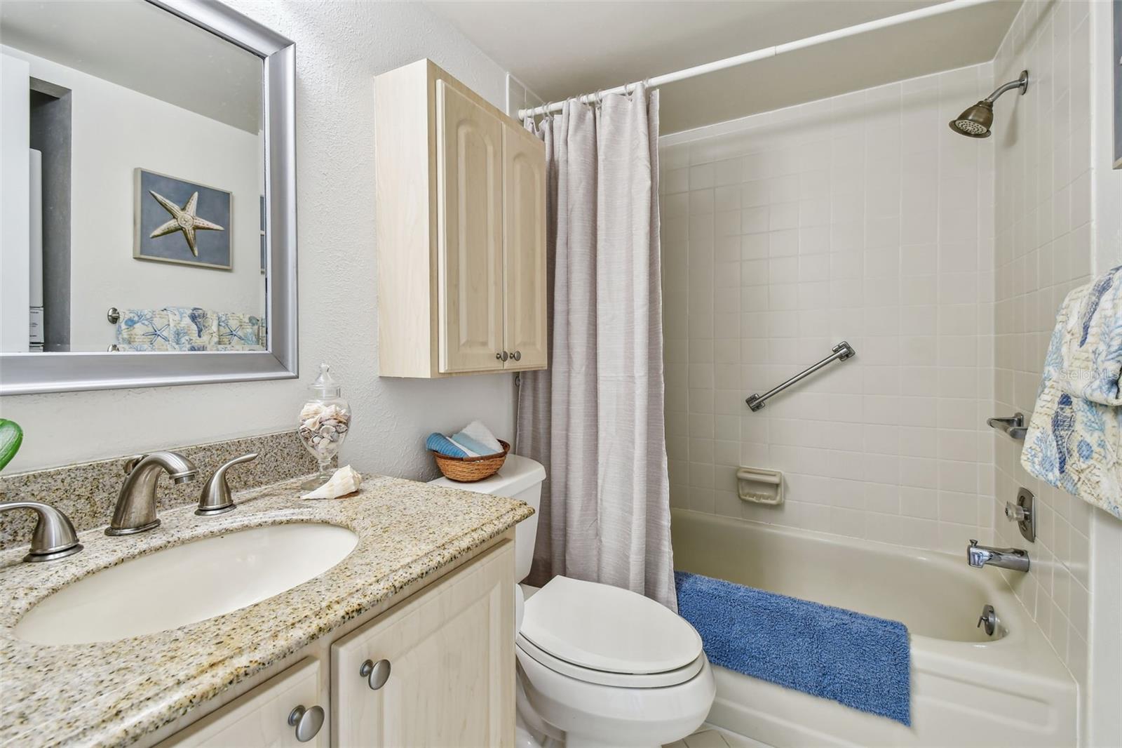 Guest bathroom with tub & shower