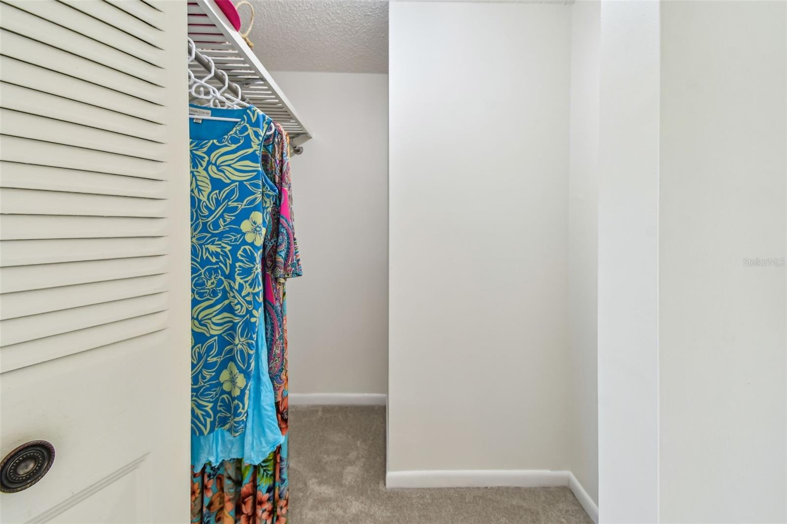 Large walk in closet in Primary