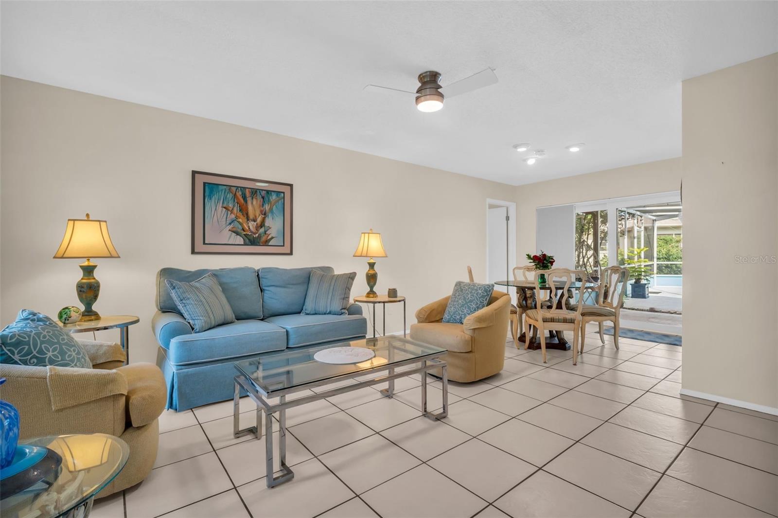 Light neutral tile flooring & updated ceiling fixtures~